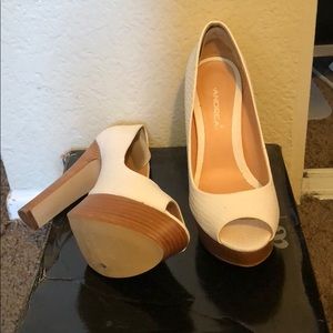 Andrea white platform heels